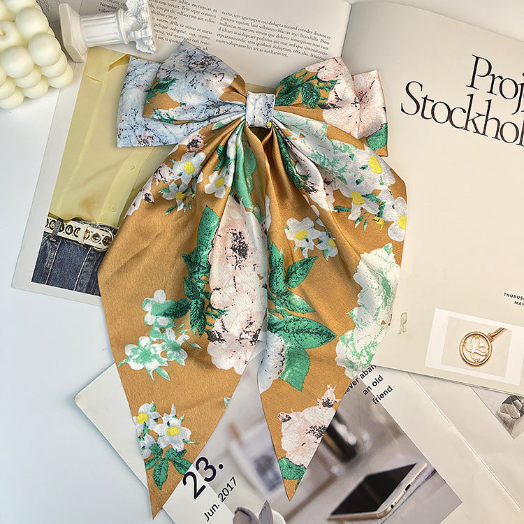 Wholesale Retro Camellia Red Big Bow Long Floating Hair Clip